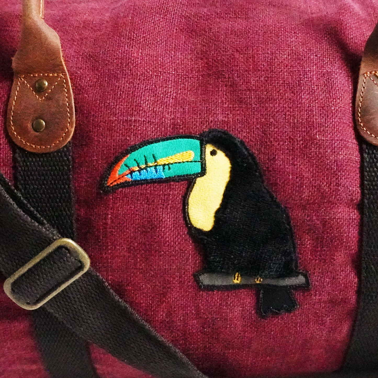Toucan Red Jute Round Duffel – Bold Embroidered Travel Bag