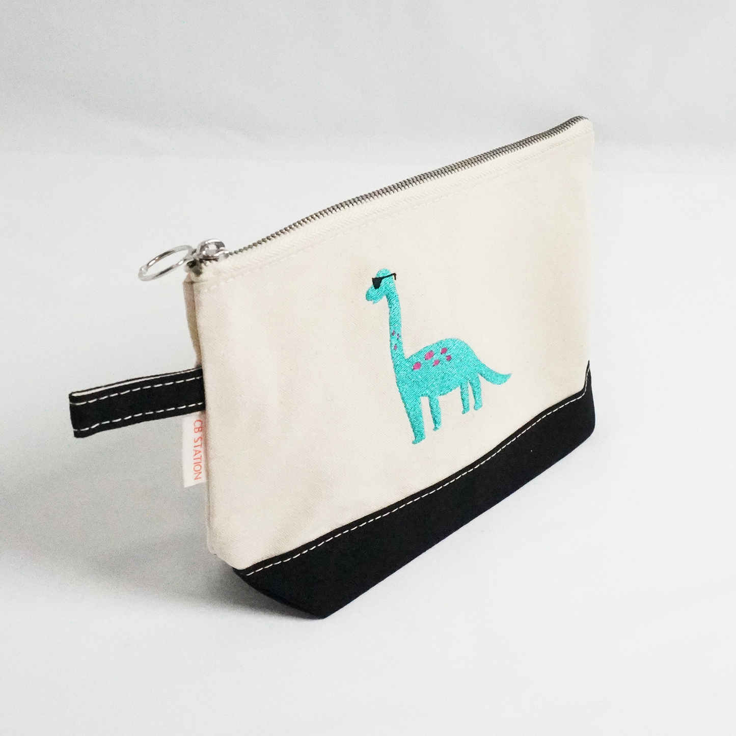 Blue Dinosaur Black Makeup Pouch – Fun and Practical Organizer for Essentials